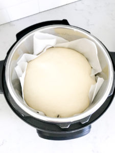 Dough rising in Instant Pot on parchment paper