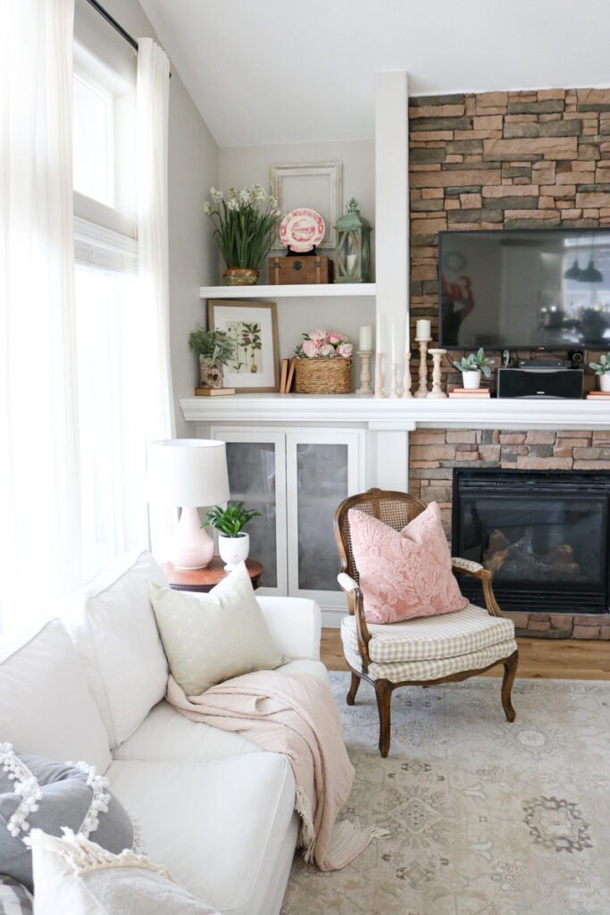 Fireplace mantle with pink accent decor