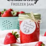 jar of strawberry freezer jam with text overlay