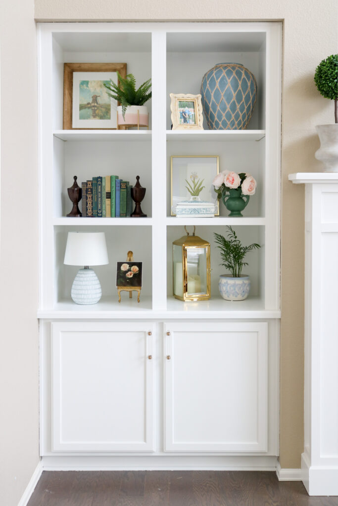 white built-in shelving with decor