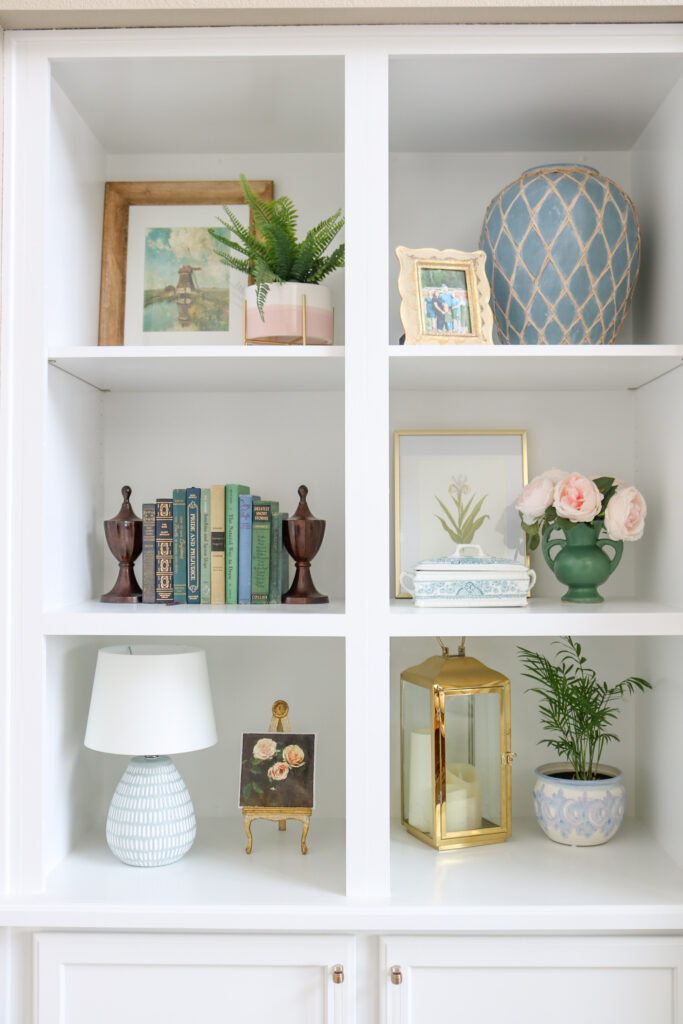 white built-in shelving with decor